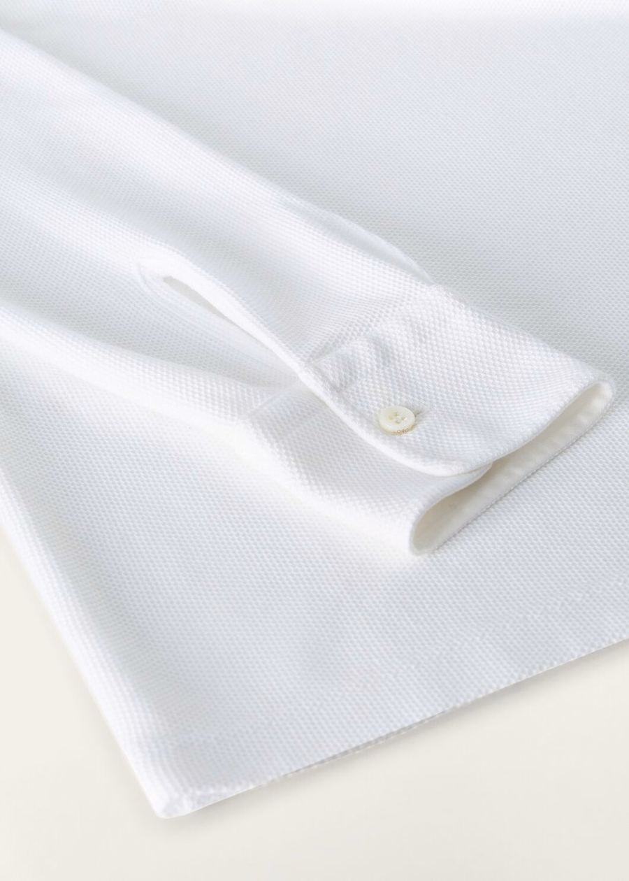 Camisa polo de algodão branco óptico