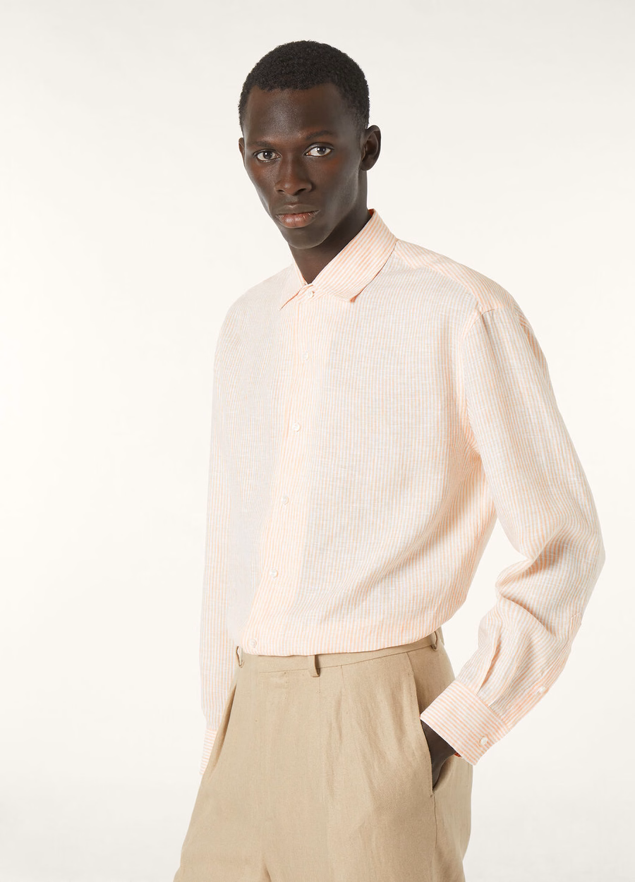 Camisa Raffaele em tom laranja pastel.