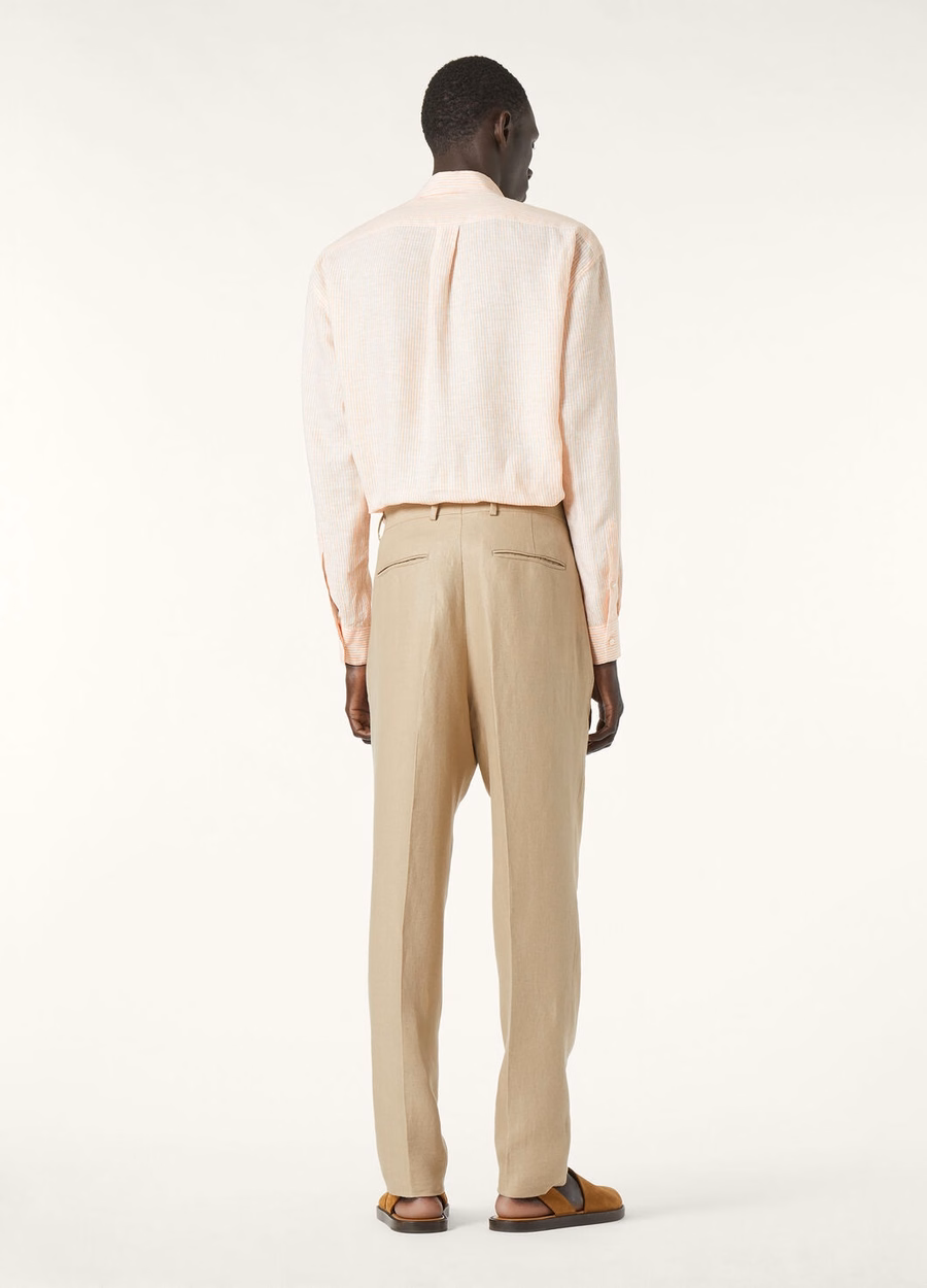 Camisa Raffaele em tom laranja pastel.