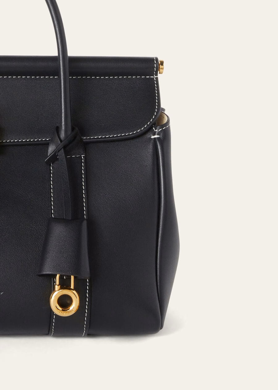 Bolsa Loom L25 em couro de bezerro preto/dourado.