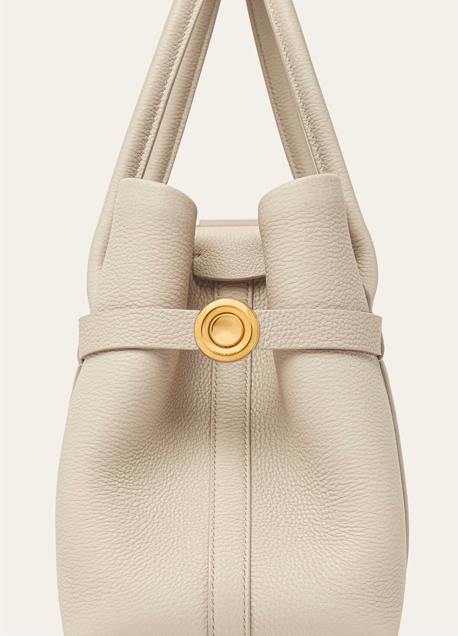 Bolsa pequena Ghiera Shopper em couro de bezerro na cor Travertino Claro/Dourado Sol